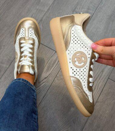 CARMELA gold and off white leather trainers